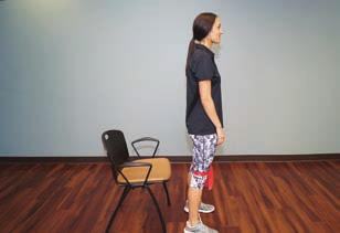 band to align knees over feet. 3. Bend forward at the hips and reach arms forward and stand up. 4.