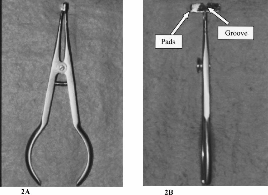 IN VIVO AND IN VITRO BOND STRENGTHS 143 FIGURE 2. Debonding plier. The plier (A) consists of a modified elastic spacer placement instrument with soldered pads.