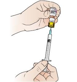 rubber stopper (see Figure 5). Make sure the needle tip is in fluid. Fig ure 5. Drawing the Solu- Cortef into the syring e 9.
