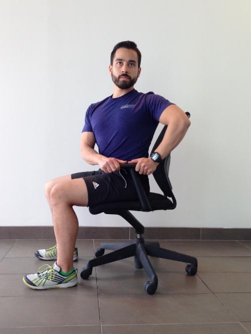 Mid/Upper Back Sit tall with knees at 90 degrees Grasp the armrest on one side of your chair with both hands Gently rotate through the torso toward