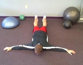 Hold the stretched position for a few seconds and return knees to the starting position.