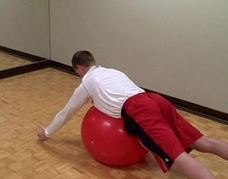 Ball T s (thumbs down) Coaching Tips: Find a medium sized stability ball; lie over the top of the ball with your chest just off
