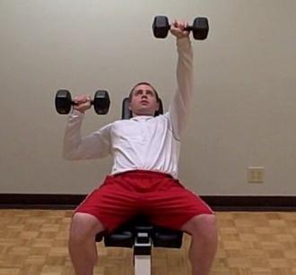 Slowly lower one dumbbell to the outside of your chest while keeping the opposite arm straight and stabile.