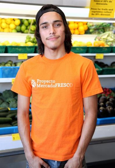 [High school senior Steven Cardona, 17, has worked with the store conversion project for the past year. He says learning about nutrition changed his family's diet dramatically.
