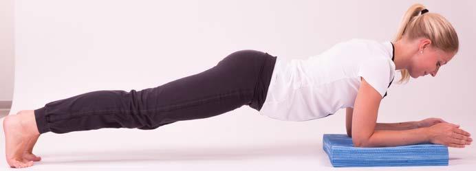 11. Sit-ups Lie down with your back on the Premium balance pad so