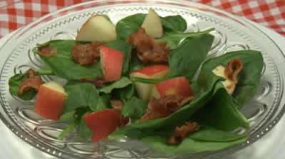 Ingredients 6 servings per recipe 1 pound fresh spinach, trimmed and cleaned 1 unpeeled red apple 3 slices bacon, fried crisp, crumbled ¼ cup frozen unsweetened orange juice concentrate, thawed ¼ cup