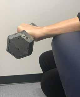 FIGURE 5 An eccentric exercise for lateral epicondylitis Continuing daily activities within permitted limits of pain leads to more rapid recovery from low back pain than rest or back-mobilizing