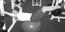 Bring knees into chest, then extend legs until tension is felt in lower abs, then return to start