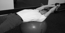 Quick Workout Back, and triceps Start in plank position on ball by