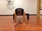 Decline Close Grip Pushups Place your feet up on the bench behind you.