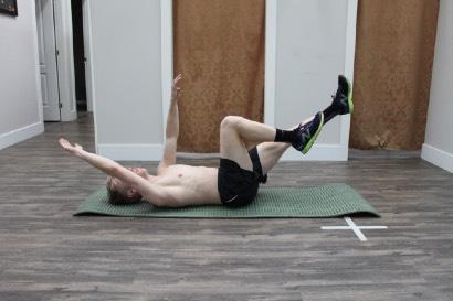 Lower opposite arm and leg to the floor.