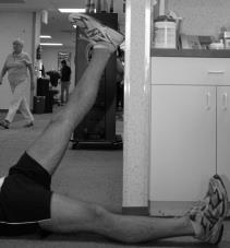 Hamstring Stretch 1. Lie on your back near the edge of a doorway or wall as shown. 2.