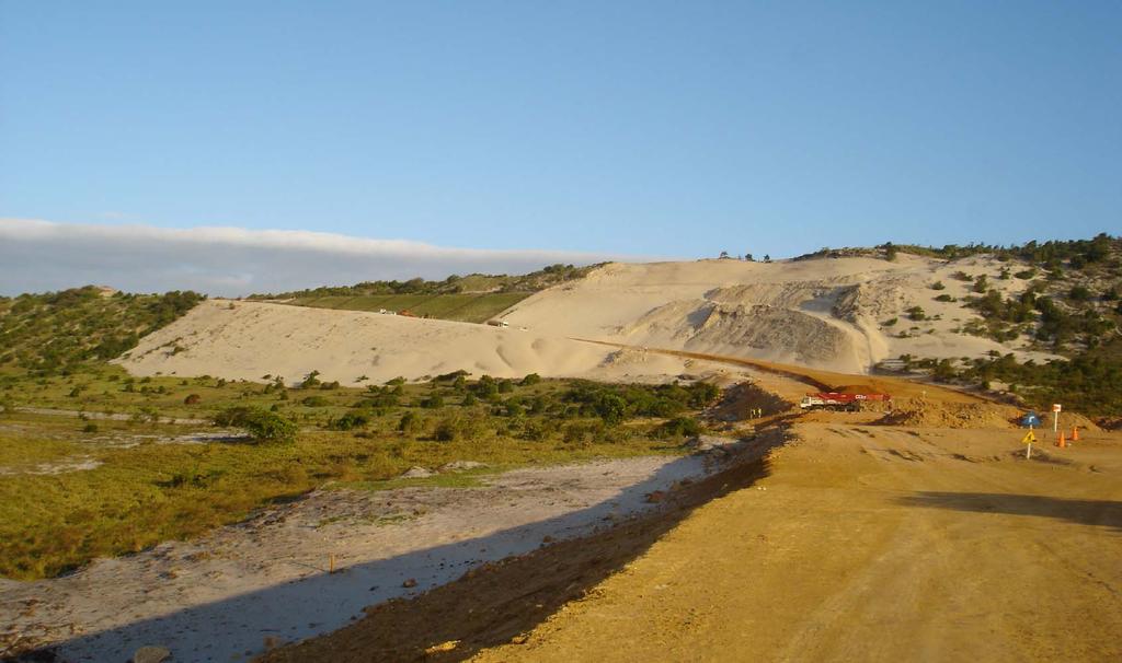 Extensive erosion resulting from high winds occurred to the side slopes of the excavated dune