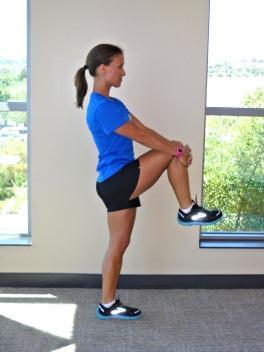 Walking Knee Hugs: Step the left foot forward, pull your right