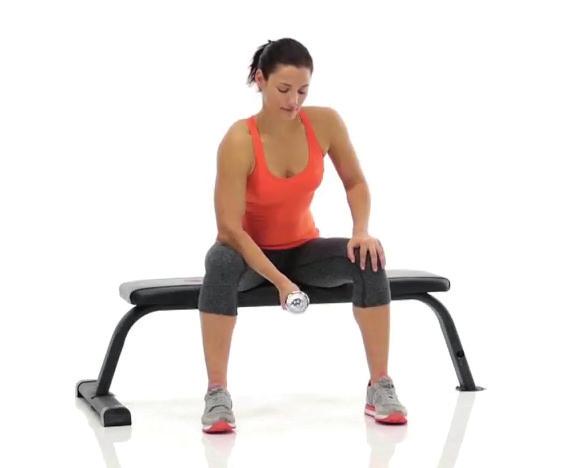 Workout one EXERCISE 7 CONCENTRATION CURL 6 1. Sit on a bench holding a dumbbell with your elbow resting on your inner thigh and your arm straight. 2.