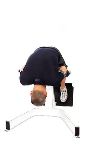 pads and your upper body bent over at waist, arms