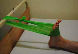 times, 3-4 times a day 8. Dorsiflexion 1. Attach the theraband or a towel to a bed s footboard. Make a loop. 2.