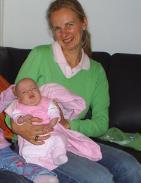 She has typical problems of an infant with an L2 lesion: hydrocephalus, dislocated hips, club feet and paraplegia.