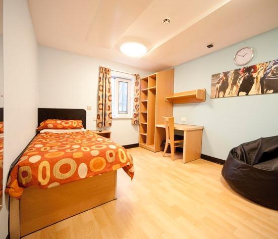 Each gender specific area contains a TV lounge, bathroom, outdoor smoking area and service user en suite bedrooms. There are 9 male and 6 female bedrooms.