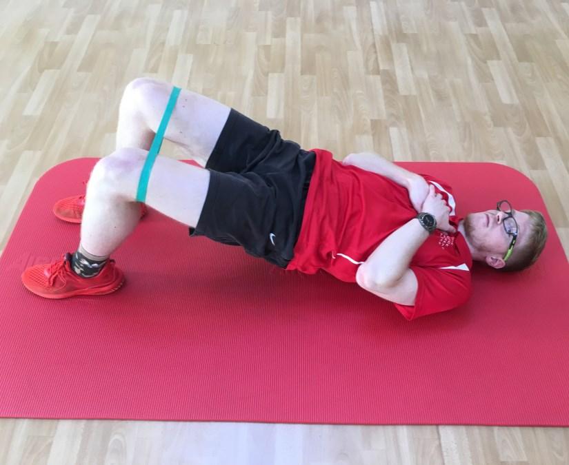 Shoulder Bridge-Hip Twist increased gluteal and hamstring activation and hip mobility. Same set up to the Shoulder Bridge exercise.