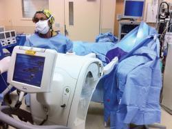 An actual intraoperative delivery; a Xoft unit is attached to a balloon ready for treatment.
