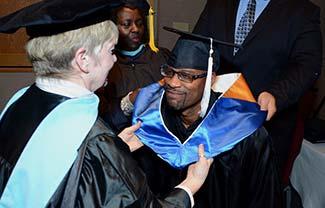 Doctoral degrees are generally conferred in formal ceremonies involving special attire and rites.