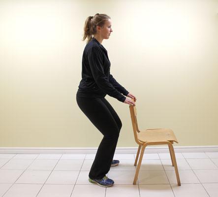 Exercise: Mini Squats Stand with feet hip-width apart, toes slightly pointed outwards, holding on to a chair for balance.