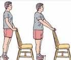 8. Fallen Arches: Up and Down FOOT & LOWER LEG EXERCISES - Continued Standing up, balance yourself on both feet behind a chair. Place your two feet in a V (turned-out) position.