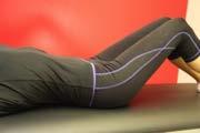 Tuck your buttocks under like in the pelvis tilt exercise.