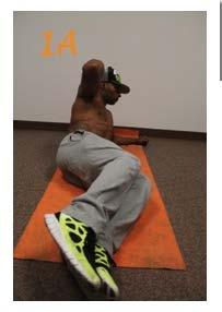 or workout mat, balanced on your left side with your legs lying on top of each other.