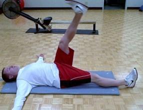 Knees Side to Side 5-6 reps each side Coaching Tips: Lie on your back with your feet flat on the floor, knees up and together. Have your arms outstretched with your palms up.