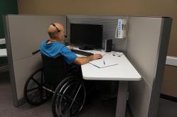 Photo: Person using a wheelchair, sitting