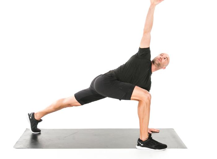 Opening WORLD S GREATEST STRETCH 45 SEC From a plank position, bring your right foot to the outside of your right hand.