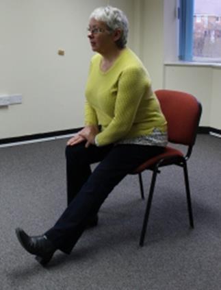 Seated back stretch - Sit tall and place your feet hip width apart.