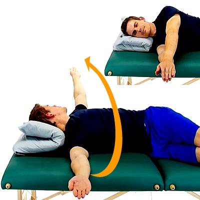 SIDELYING TRUNK ROTATION While lying on your side with your arms out-stretched in front of your body, slowly twist