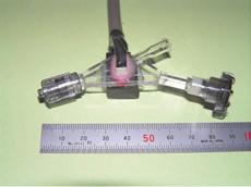 configured around the Y-connector that has been conventionally used in surgical operations of cerebral arteries.