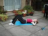 Floor work Tums Lying on your back on the floor with your knees bent and feet about hip width apart.