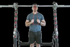 TRICEP PUSHDOWNS Triceps Biceps, forearms 1. Loop the band around a stationary bar overhead 2.