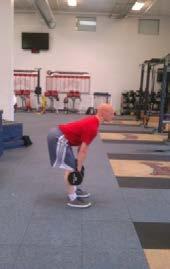 DB RDL: : in a tall position with dumbbells in hand, palms facing