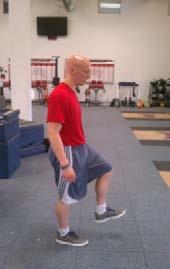 Transition: Press dumbbells overhead until arms are extended, keep palms facing each