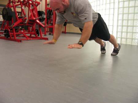 Drop down into a deep push-up position so your upper