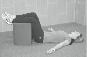 10 Static Back: The Single MOST IMPORTANT Exercise, Helps You Walk Properly, Sets Stage for Back Pain Elimination. Hold for five minutes. Lie on your back with your legs up over a block or a chair.