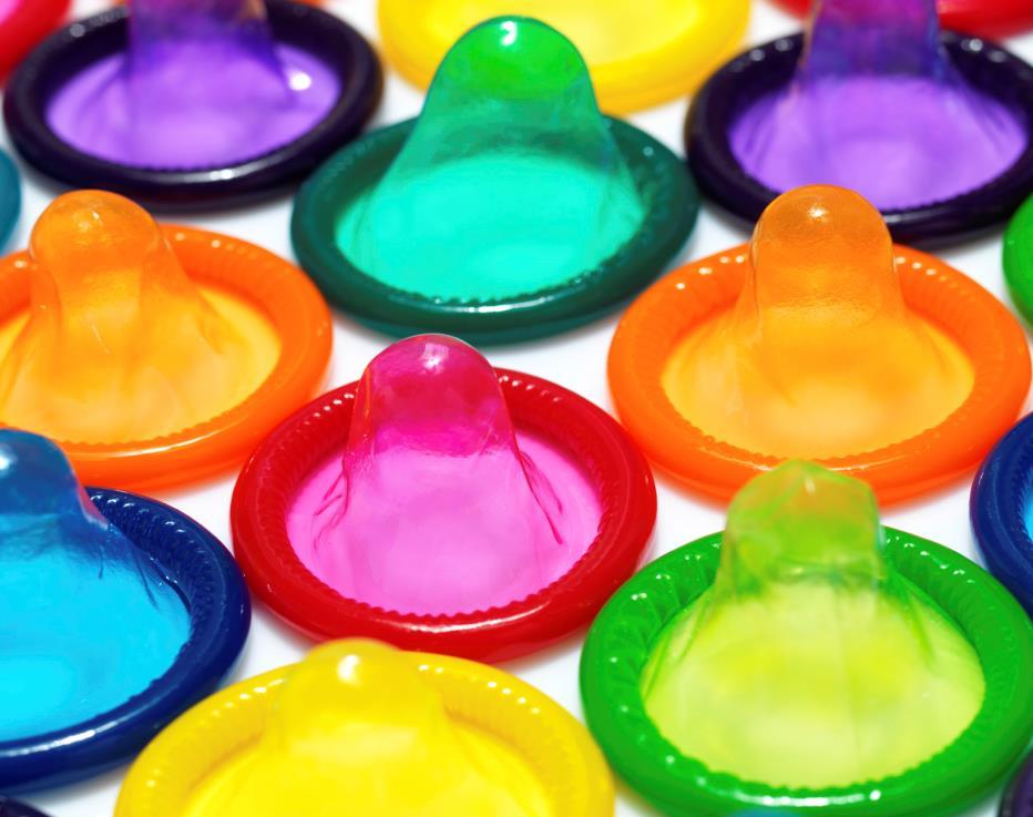 The rubber latex coverings of the condom act as a physical barrier to sperms.