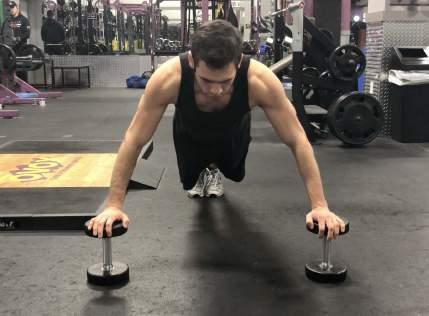 CHEST DB Pushups 1. Place two dumbells wider than shoulder width apart. 2.