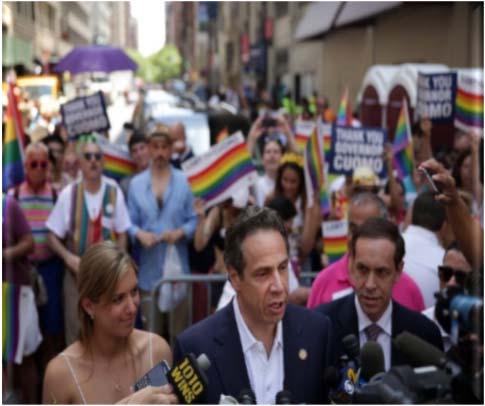 2 Governor Andrew Cuomo announcing his new initiative to combat the AIDS epidemic before the 2014 NYC Gay Pride Parade.