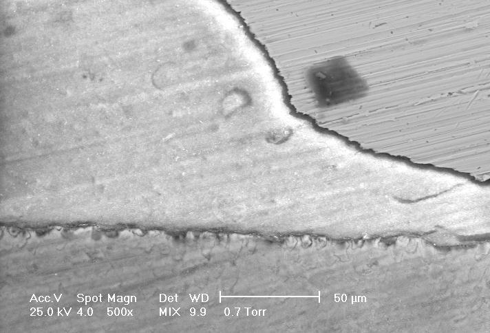c), prisms appeared smooth compared to image of demineralized enamel interface, figure 11.c) where the surface area over which adhesion is achieved is much higher [13, 14].