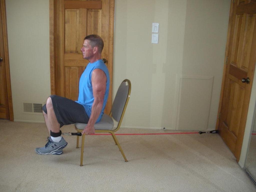 Leg Extension Door anchor is at bottom of door and the band is going directly underneath chair Hips, knees and