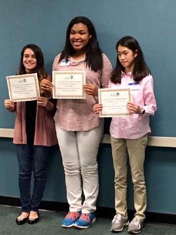First place: Erin Yoo ($75); Second place: Nkechi Holmes and Third place: Sophia Sobrino ($25.) Also present were Pam Dycus (teacher) and John Tanner (principal) from Campbell Middle School.