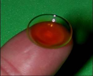 Step 3: Fluorescein Evaluation Instill one (1) drop of high molecule Fluorescein (i.e. FluoreSoft ) into the bowl of the lens and