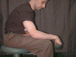2. Wrist Flexion. Place 1 lb. weight in hand with palm facing upward (supinated); support forearm at the edge of a table or on your knee so that only your hand can move.